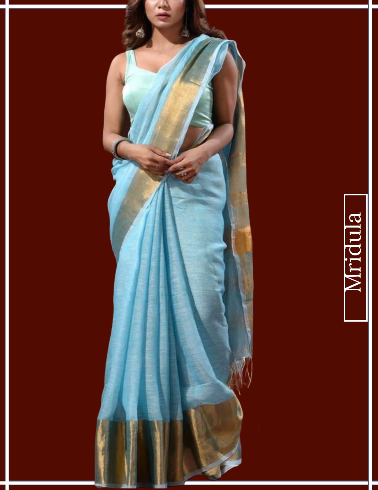 Woman wearing a sky blue pure linen Kasavu saree with a golden zari border
