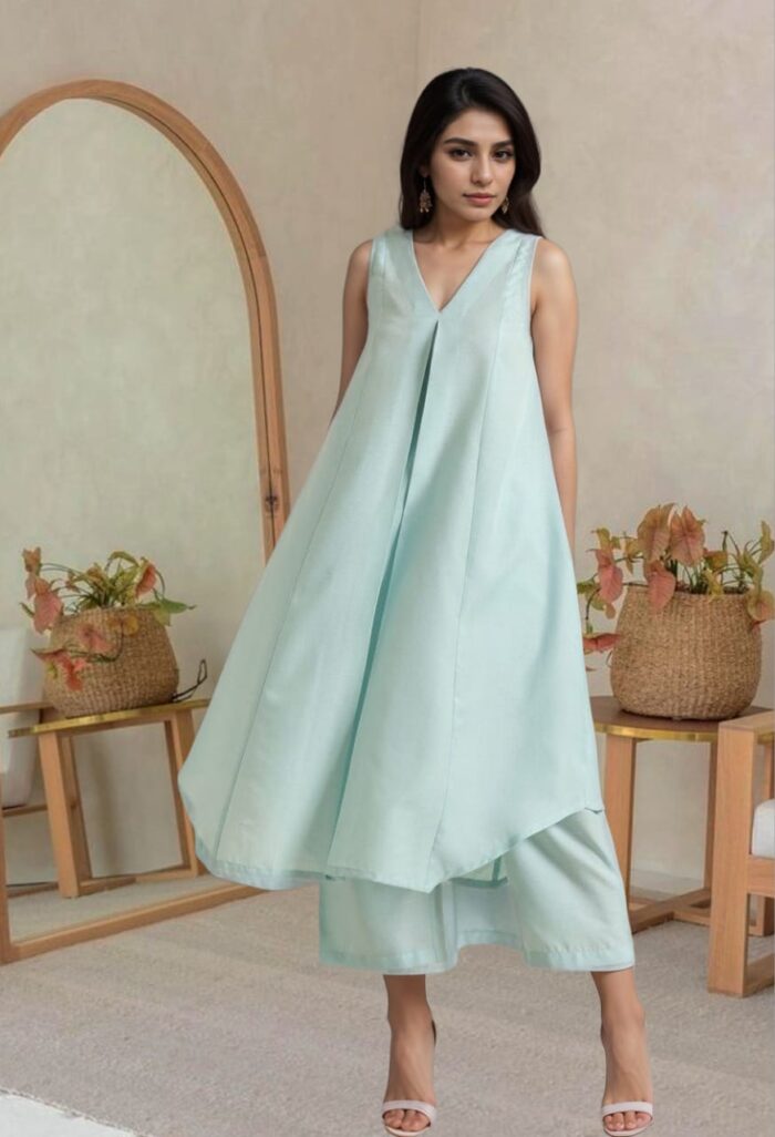 Pastel blue sleeveless A-line cotton kurta set with palazzos by Mridula