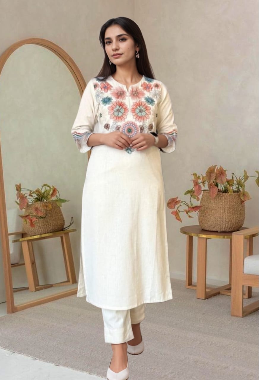Model wearing ivory cotton kurta with multicolor floral embroidery