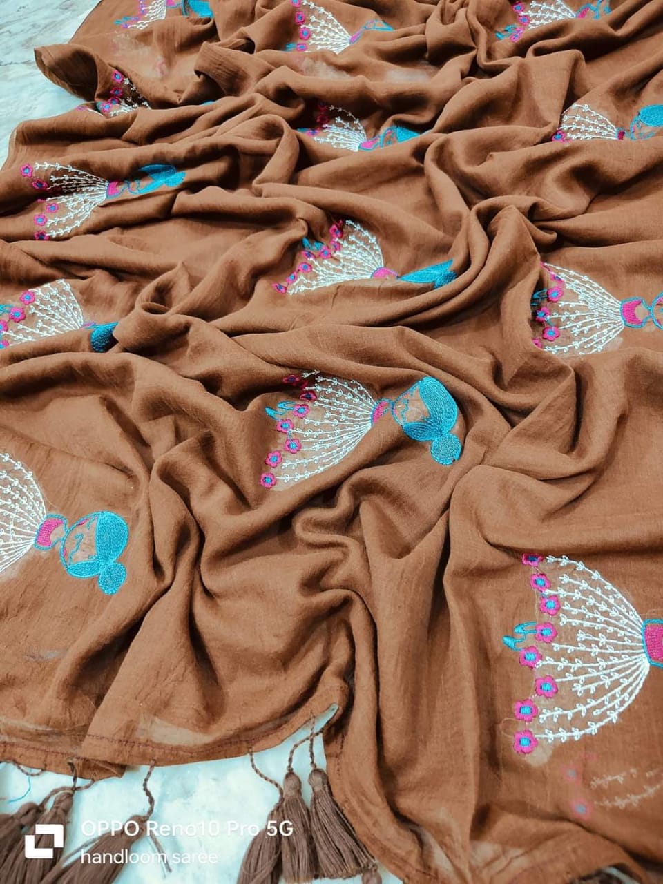 Brown mul cotton saree with handcrafted doll embroidery
