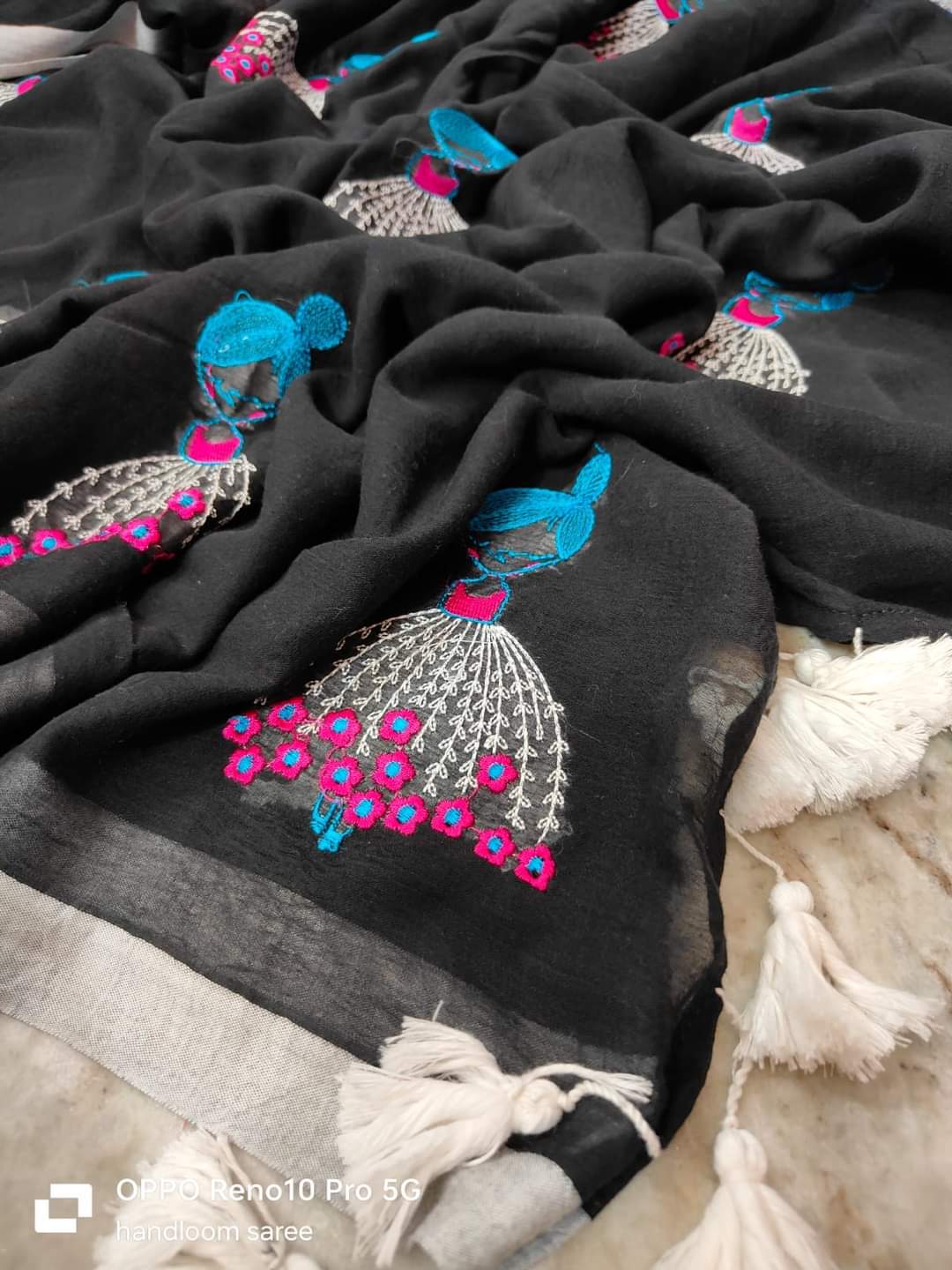 Black mul cotton saree with handcrafted doll embroidery and tassels